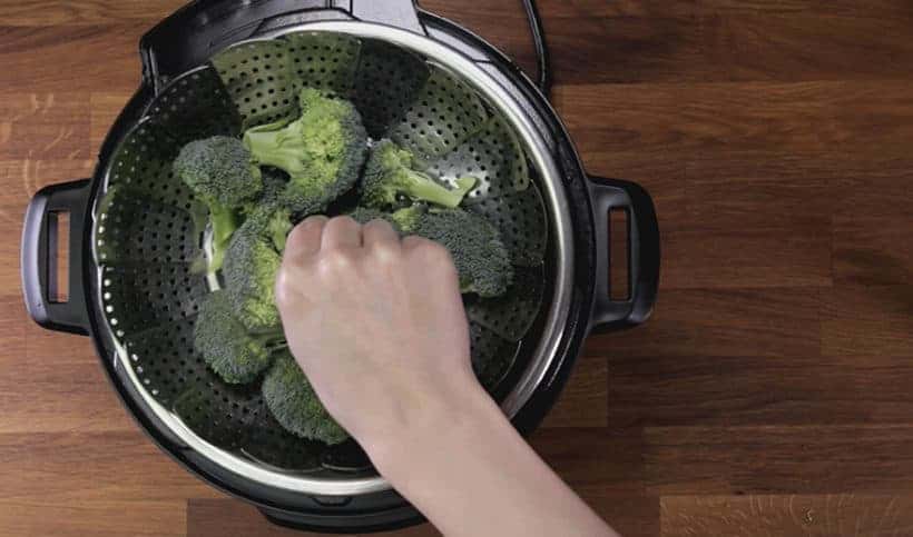 Instant Pot Broccoli Recipe: add steamer basket in Instant Pot with broccoli florets #instantpot #pressurecooker #vegan #vegetarian #recipe #keto #paleo