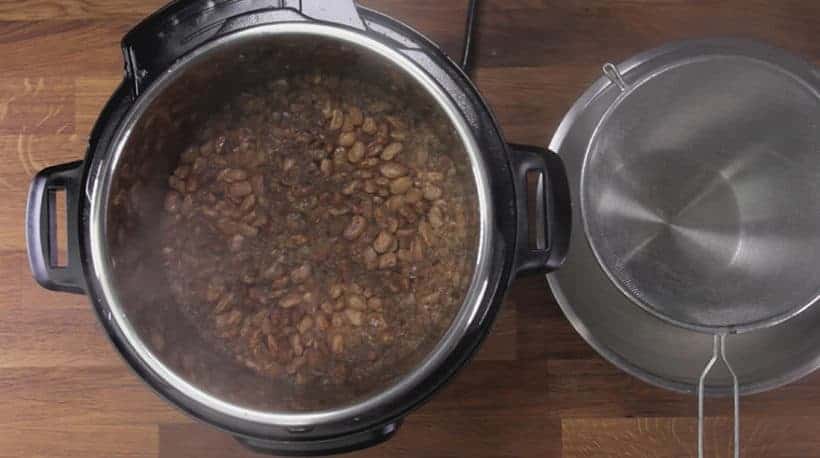 Instant Pot Refried Beans Recipe: strain pressure cooked beans with strainer #instantpot