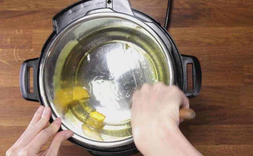 Instant Pot Butter Chicken: add ghee in Instant Pot Pressure Cooker