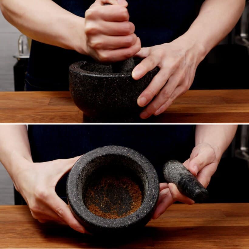 ground cumin with mortar and pestle