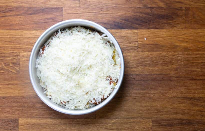 Instant Pot Lasagna: add freshly grated Parmesan cheese on top of lasagna in Instant Pot Pressure Cooker