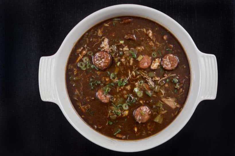 Make Mouthwatering Louisiana Instant Pot Gumbo Recipe (Pressure Cooker Gumbo): a hearty Southern pot of love packed with smoky-spicy Cajun, Creole flavors and rich aromas. Feed your crowd with this delicious party favorite - not just for Mardi Gras! #instantpot #instantpotrecipes #gumbo #pressurecooker #pressurecookerrecipes